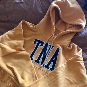 TNA Cropped Hoodie in Mustard Yellow
